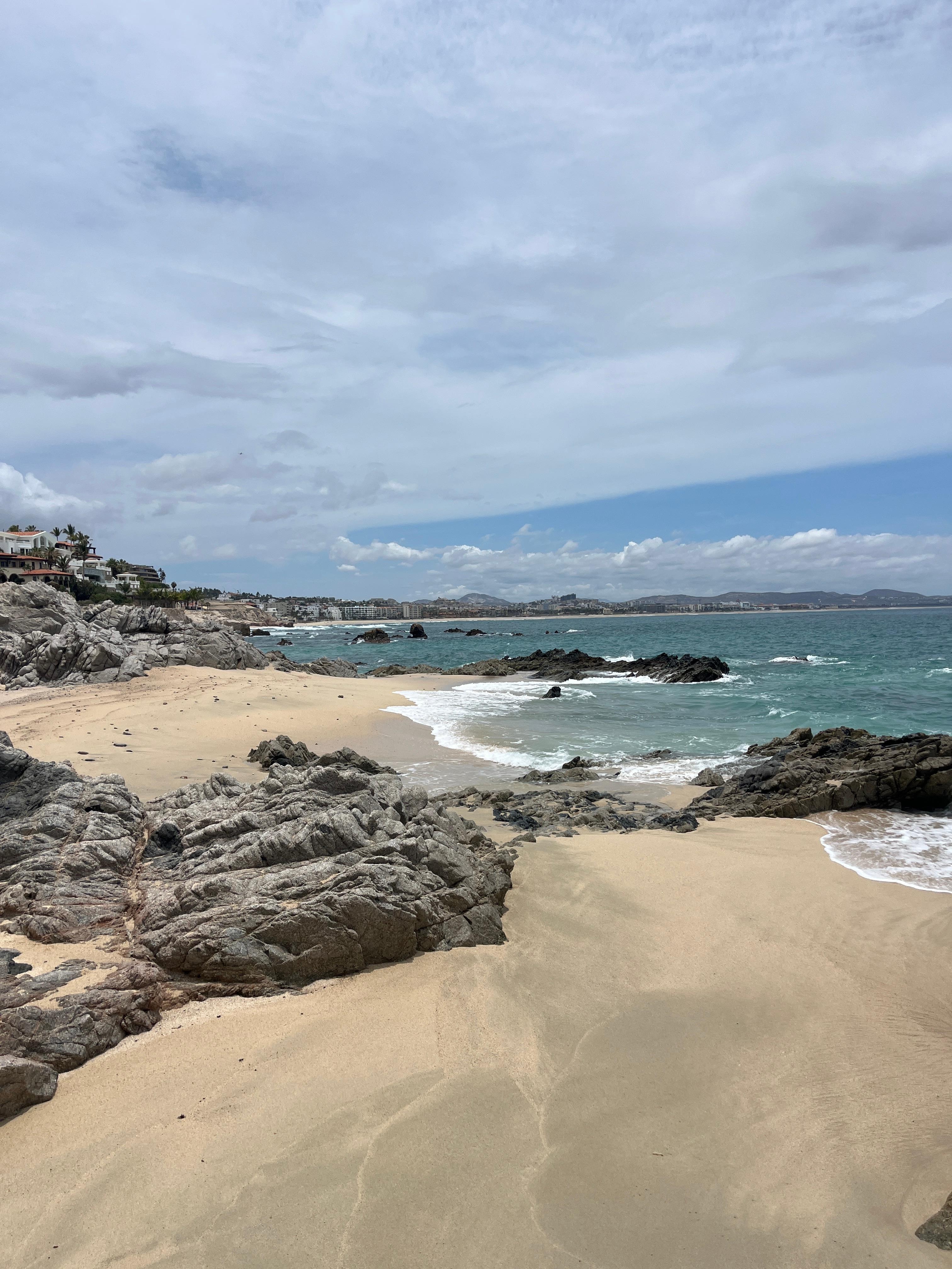 View along looking toward Old Man’s on Palmilla Beach at the bottom of beach access stairs