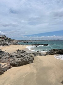 View along looking toward Old Man’s on Palmilla Beach at the bottom of beach access stairs