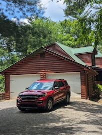 Side view of the home with plenty of parking