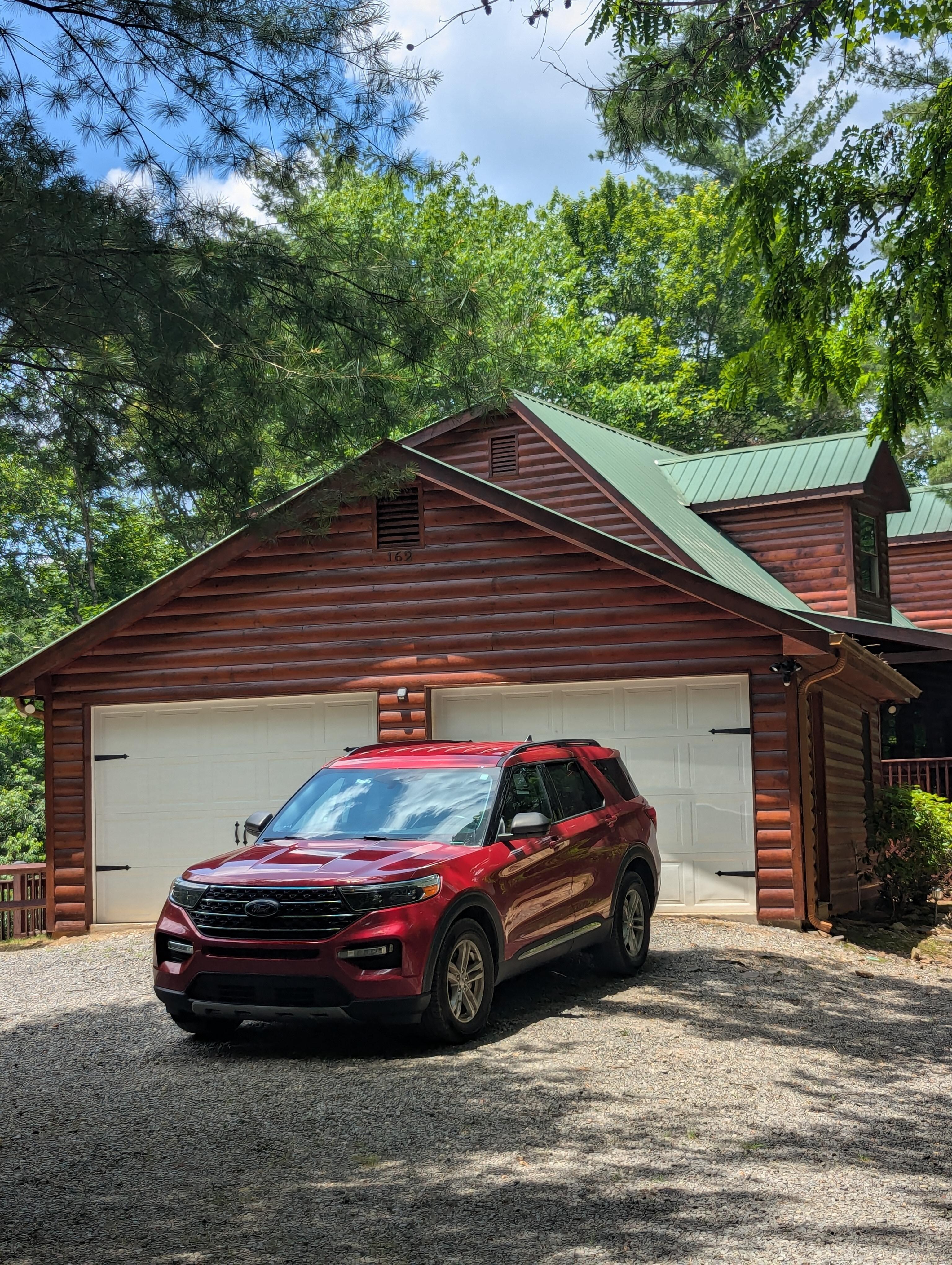 Side view of the home with plenty of parking