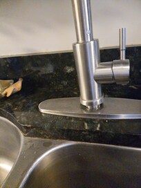 Kitchen faucet came loose around day 2
