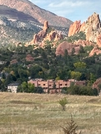 While hiking in Red Rock Canyon we caught a view of the property. The beige home to the left in the forefront of the photo. Garden of the Gods out the back door!
