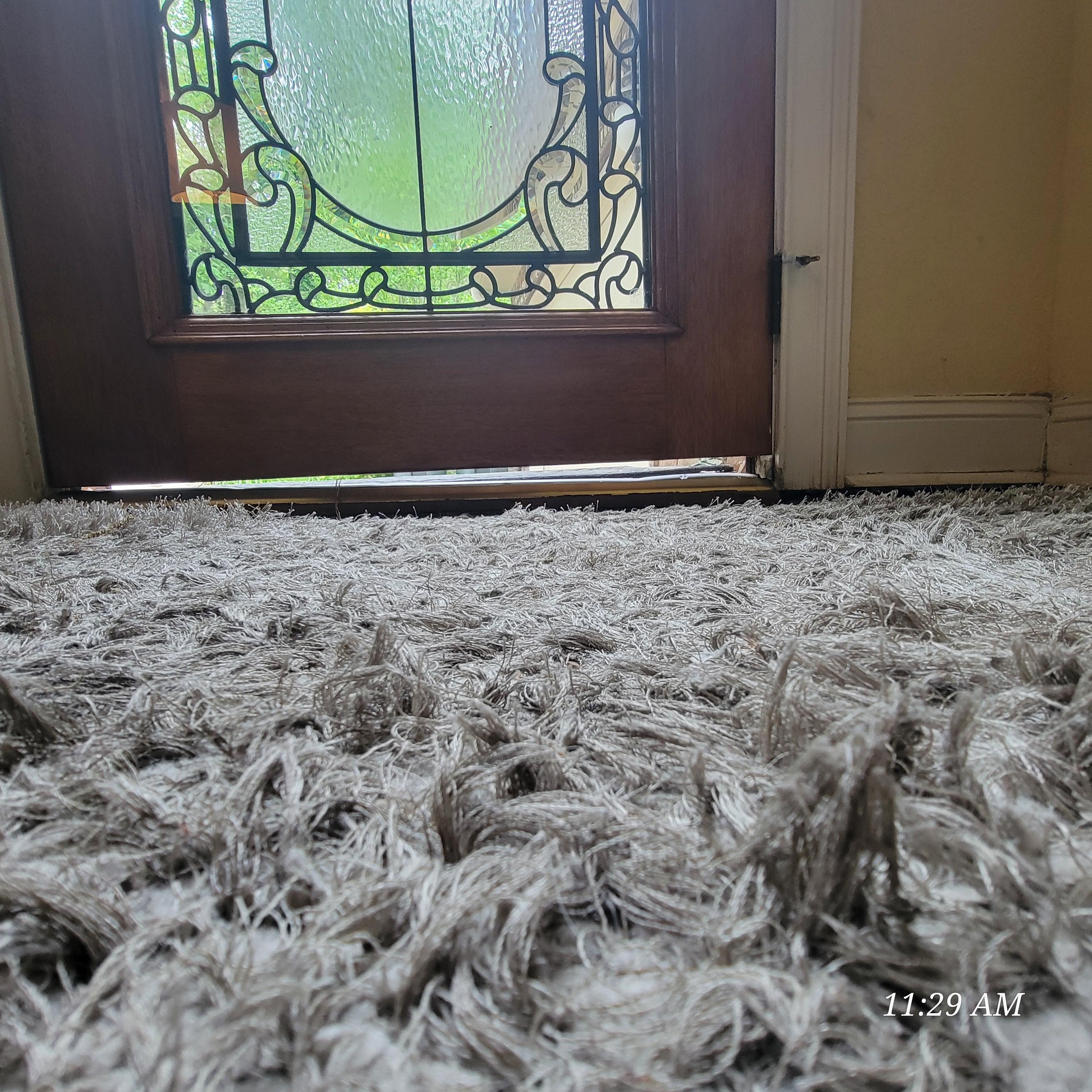 1.5 inch gap at bottom of door on hinge side due to floor sinking water damage.