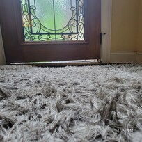 1.5 inch gap at bottom of door on hinge side due to floor sinking water damage.