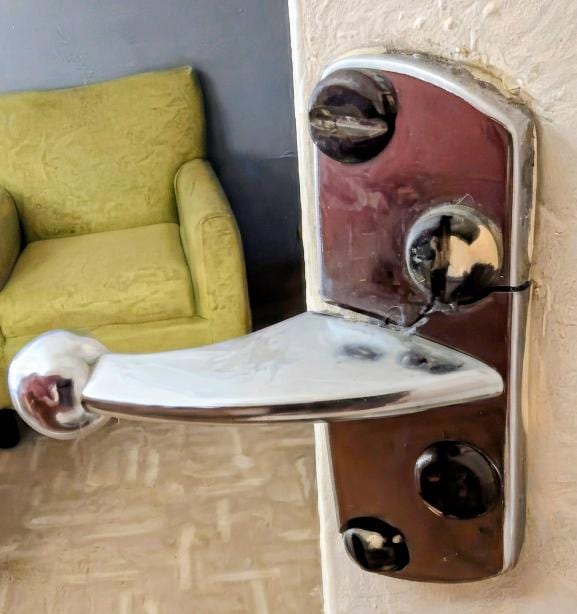 Broken catch of security lock on entry door - was fixed after checking