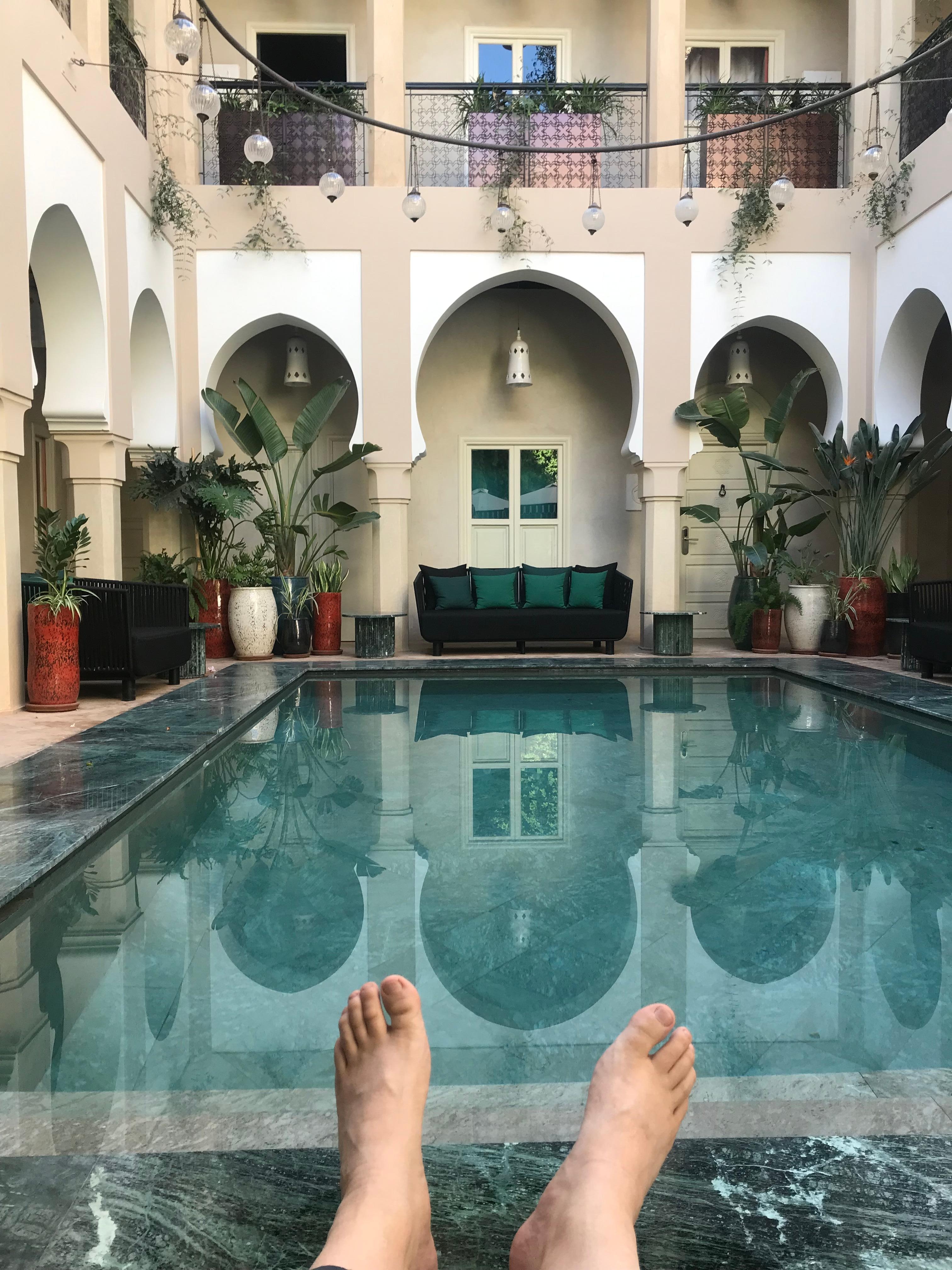 Relax at the pool after a day of shopping 