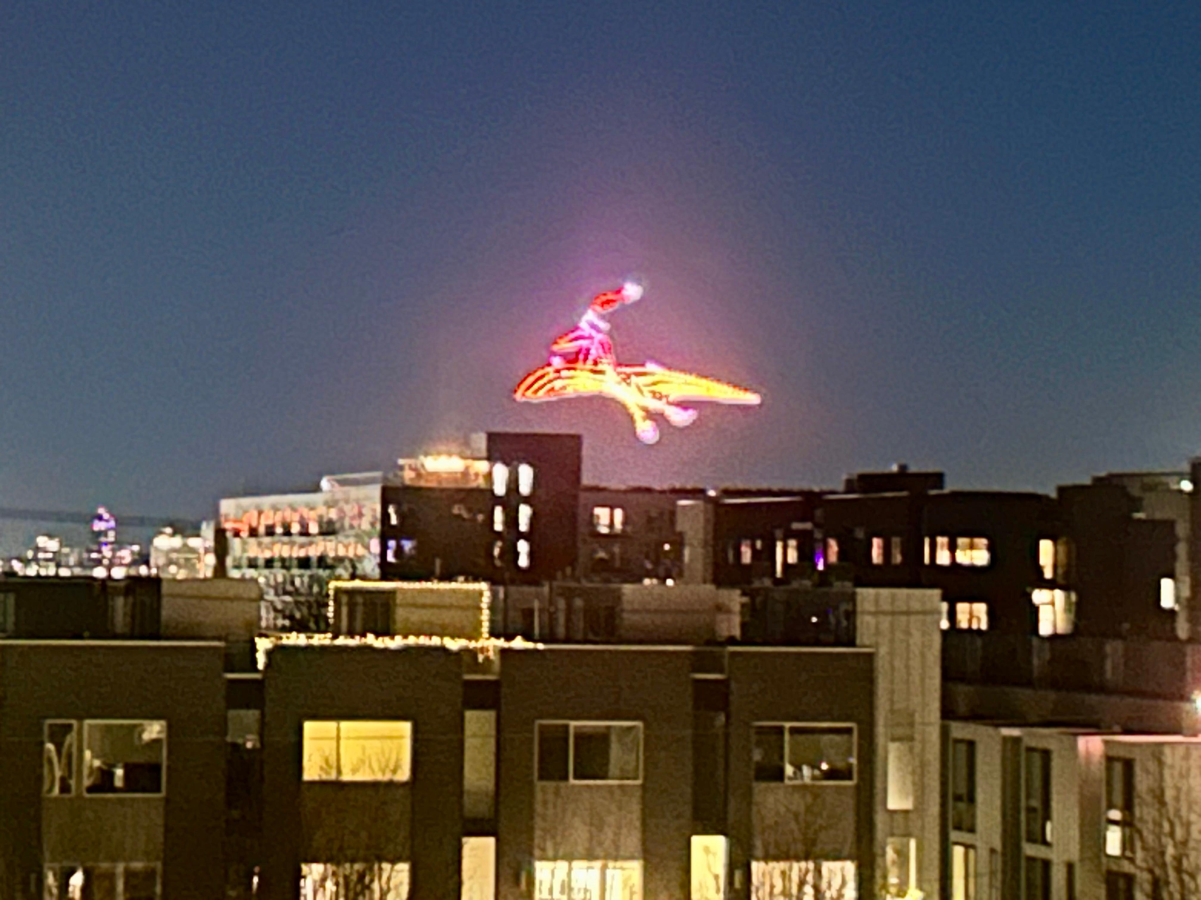 Drone light show from rooftop deck