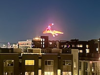 Drone light show from rooftop deck