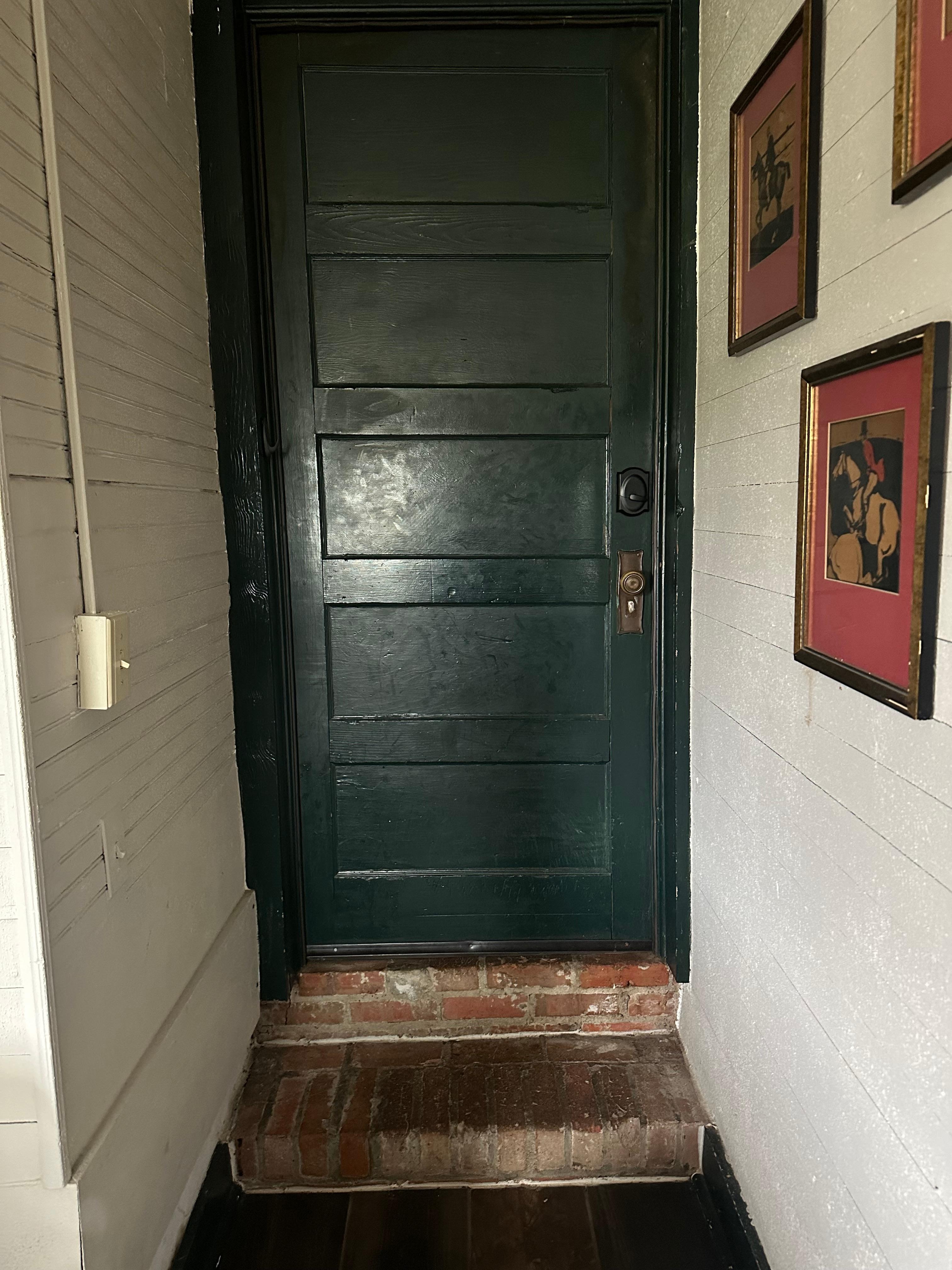 Inside the front door - love the exposed brickwork. 