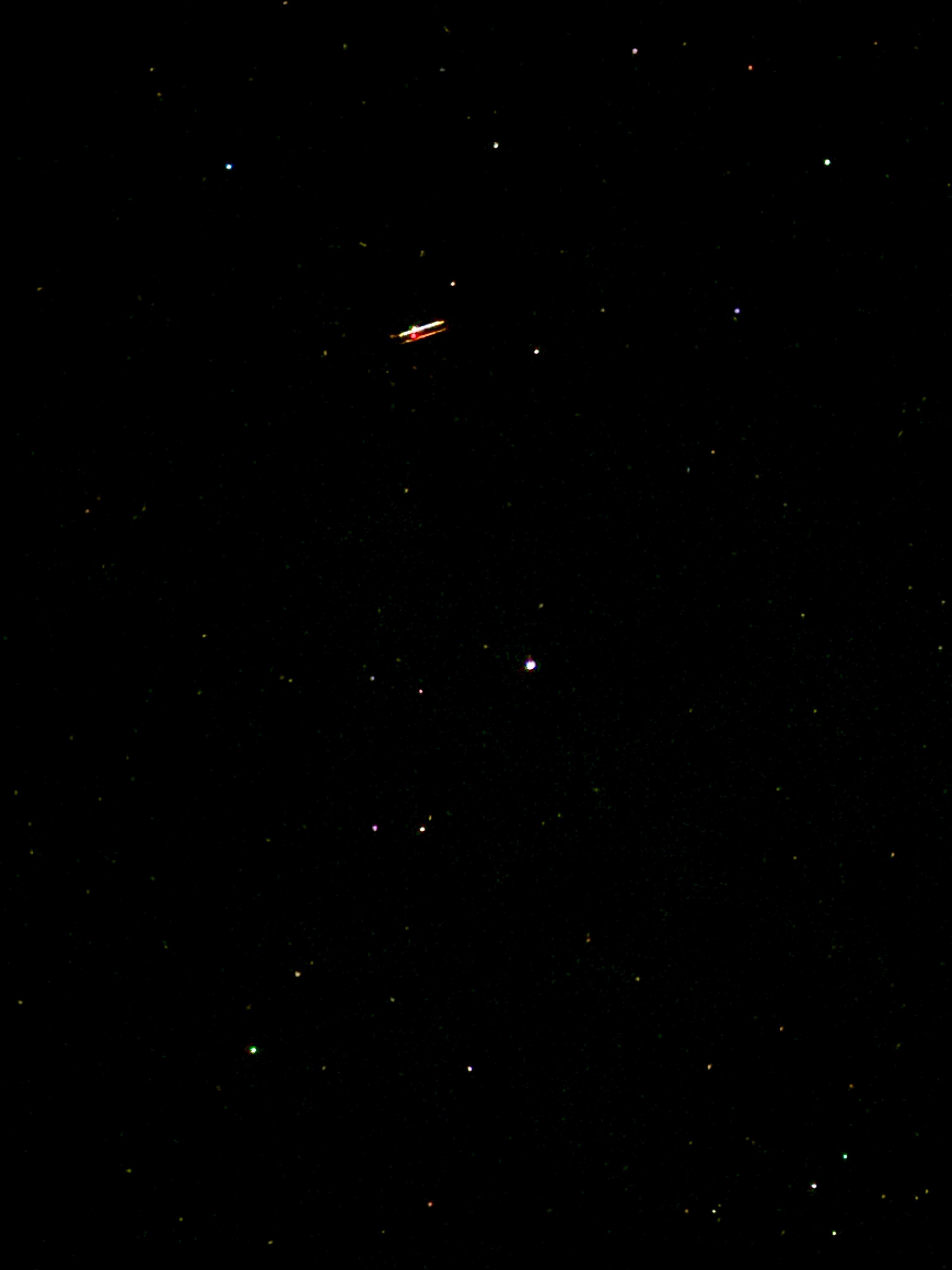 saturn with a moving plane (view from the backyard) 