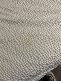 Stains on bed sheets