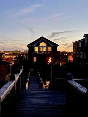 Sunset behind the house