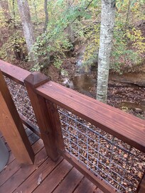 Creekside deck and hot tub