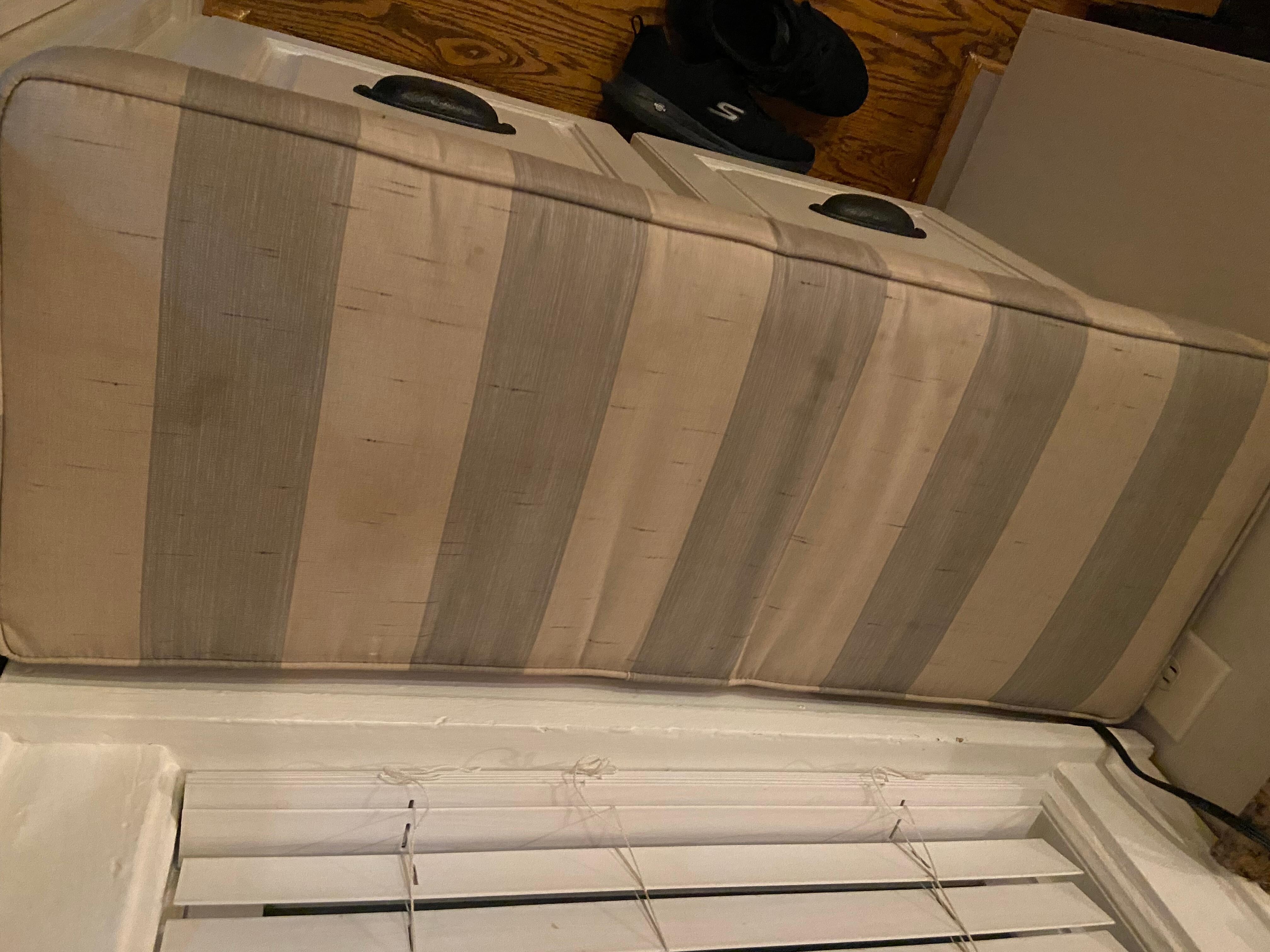 One cushion in kitchen window bench seat. Other one looks same.