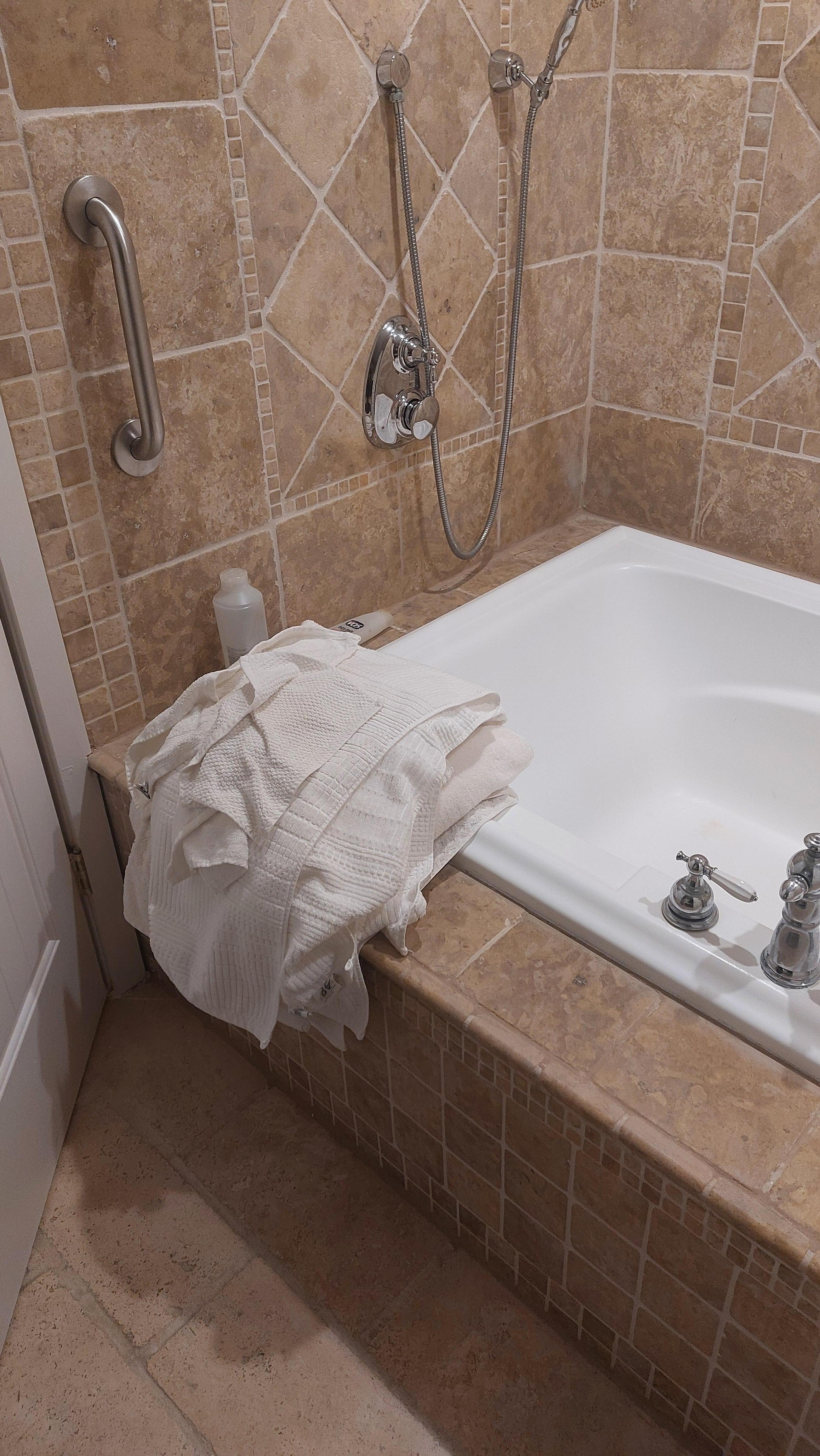 not only visibly dirty, damp and a dead bug under the top towel