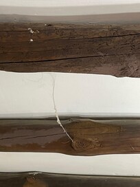 Cobwebs on the beams.