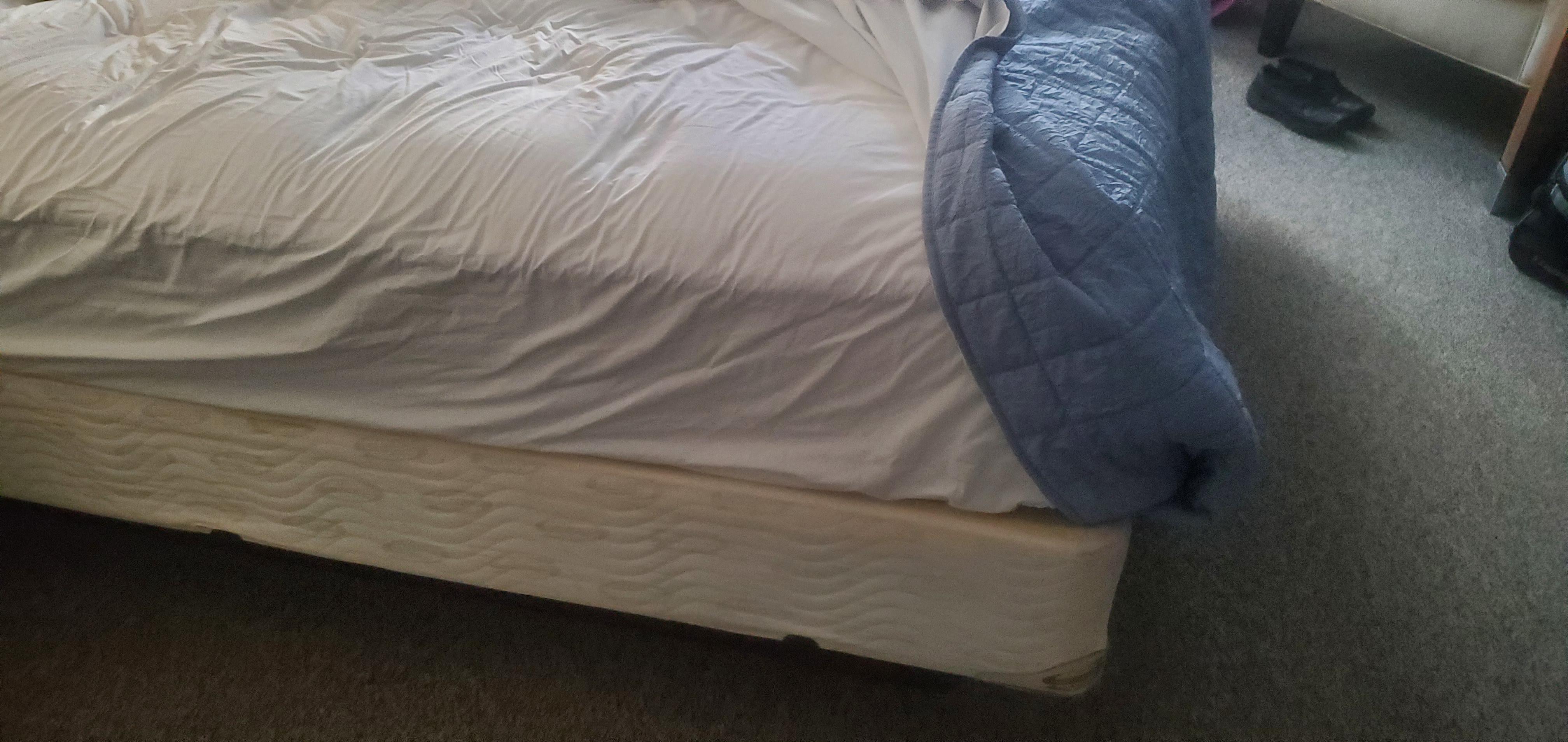 the bed was comfortable, but lacks a bed skirt, protective cover, or real comforter. Check that your sheets are not stained. if possible bring your own.