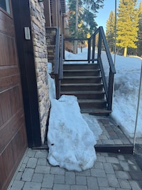 Front door entry steps ice and snow cover
