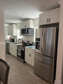 New Kitchen with front load washer /dryer