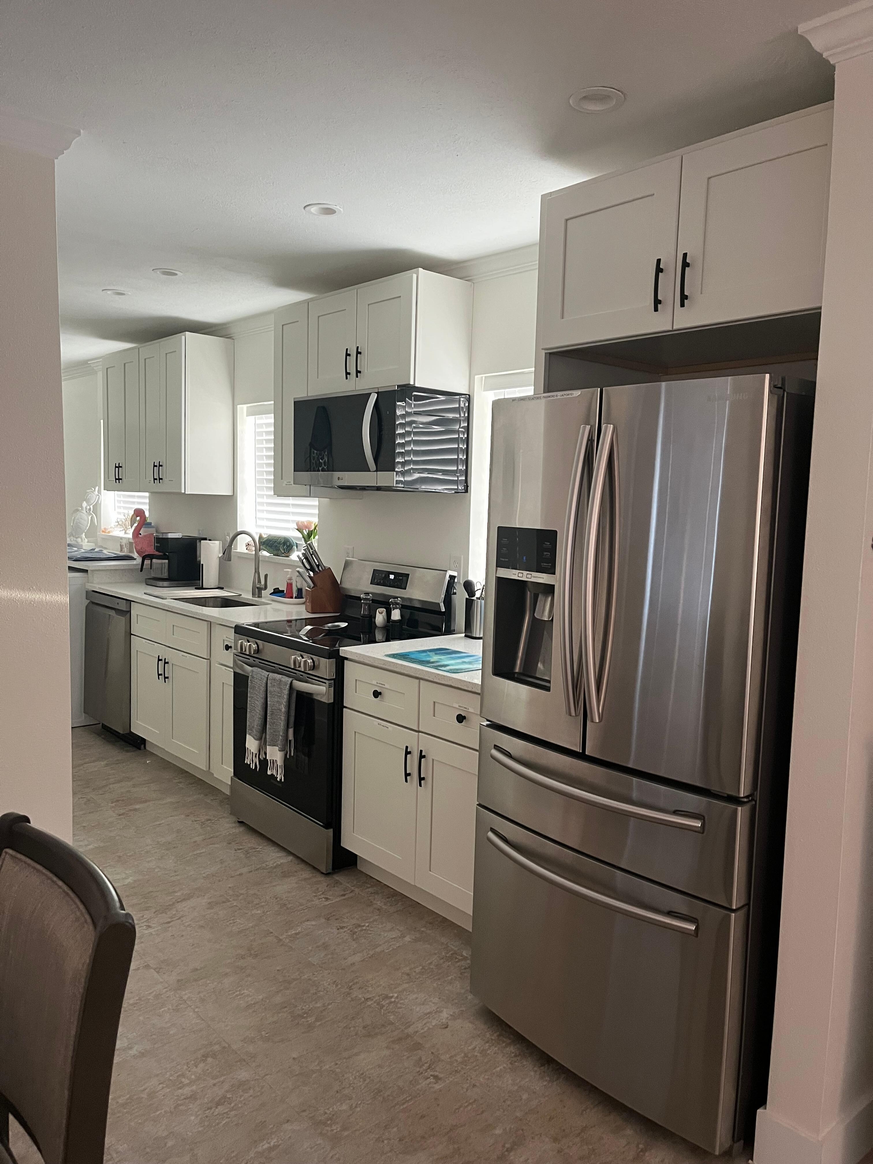 New Kitchen with front load washer /dryer