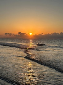 Beautiful sunrise viewed from the beach outside the Condo!