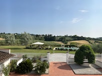 Pool and yard from villa