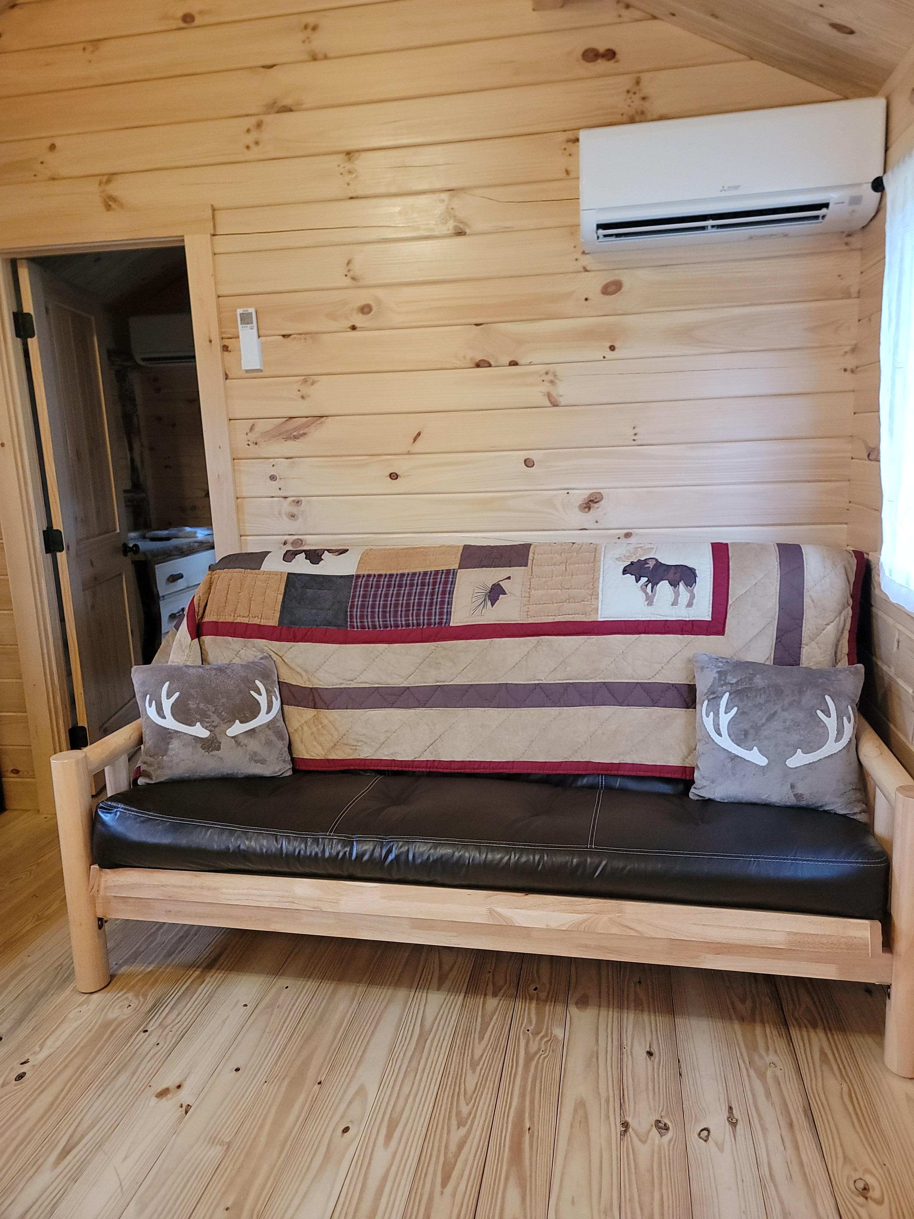 A place to lounge, or if necessary, folds into a bed