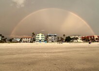 Yellow building is Tommy’s on the beach.