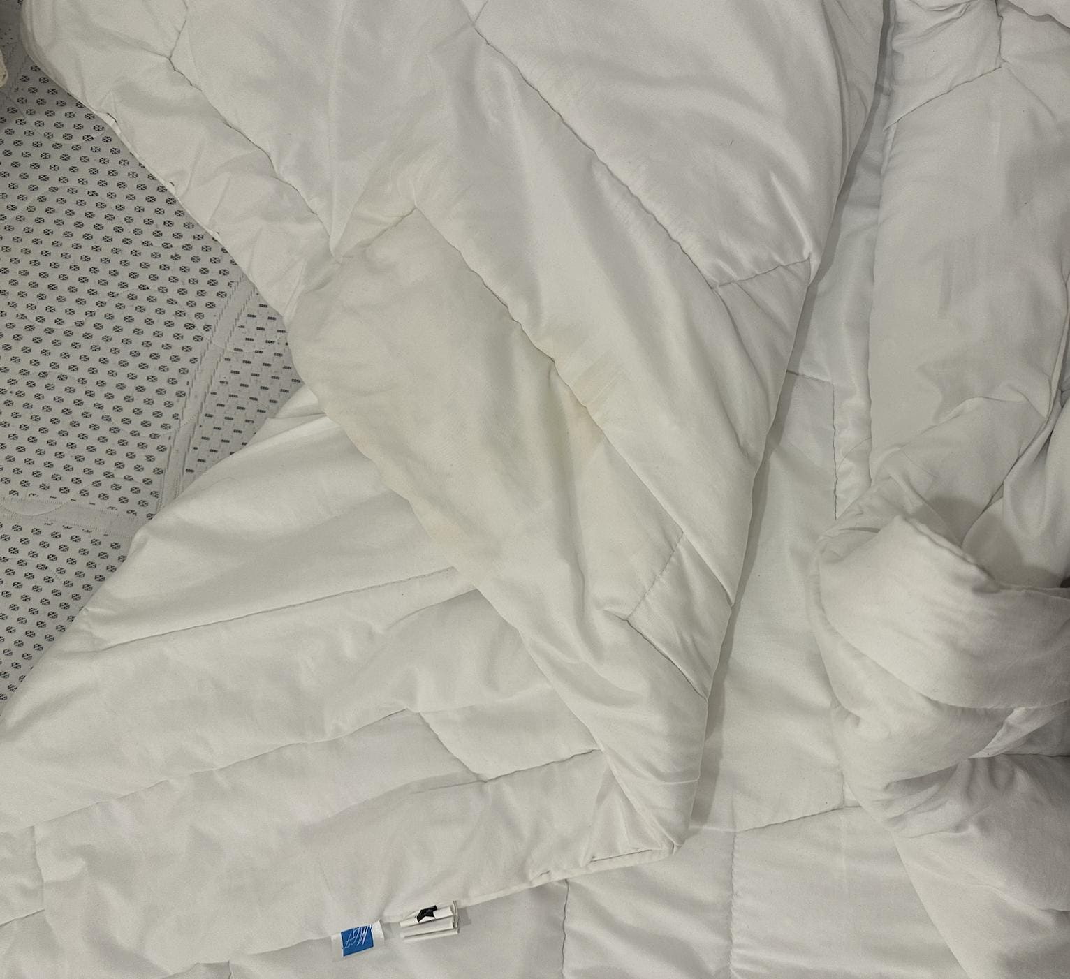Stained duvet for sleeper sofa with no duvet cover provided