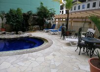 Swimming pool + outdoor dining area