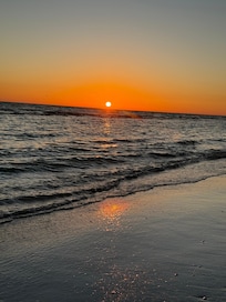 The beach is raked every morning and plenty of free chairs!