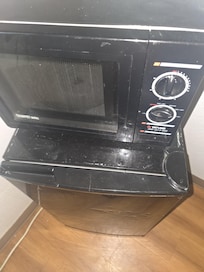 microwave and refrigerator filthy