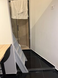 Bigger bedroom accessible via stairs