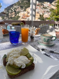 Fresh squeezed orange juice with their version of avocado toast - chefs kiss!