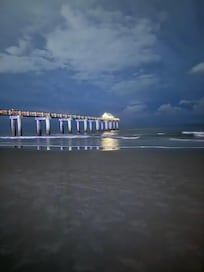 Pier at night during a storm