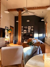 The exposed brick and the original beads made this face like staying in a tiny piece of history.