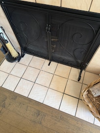 Broken fireplace tile.