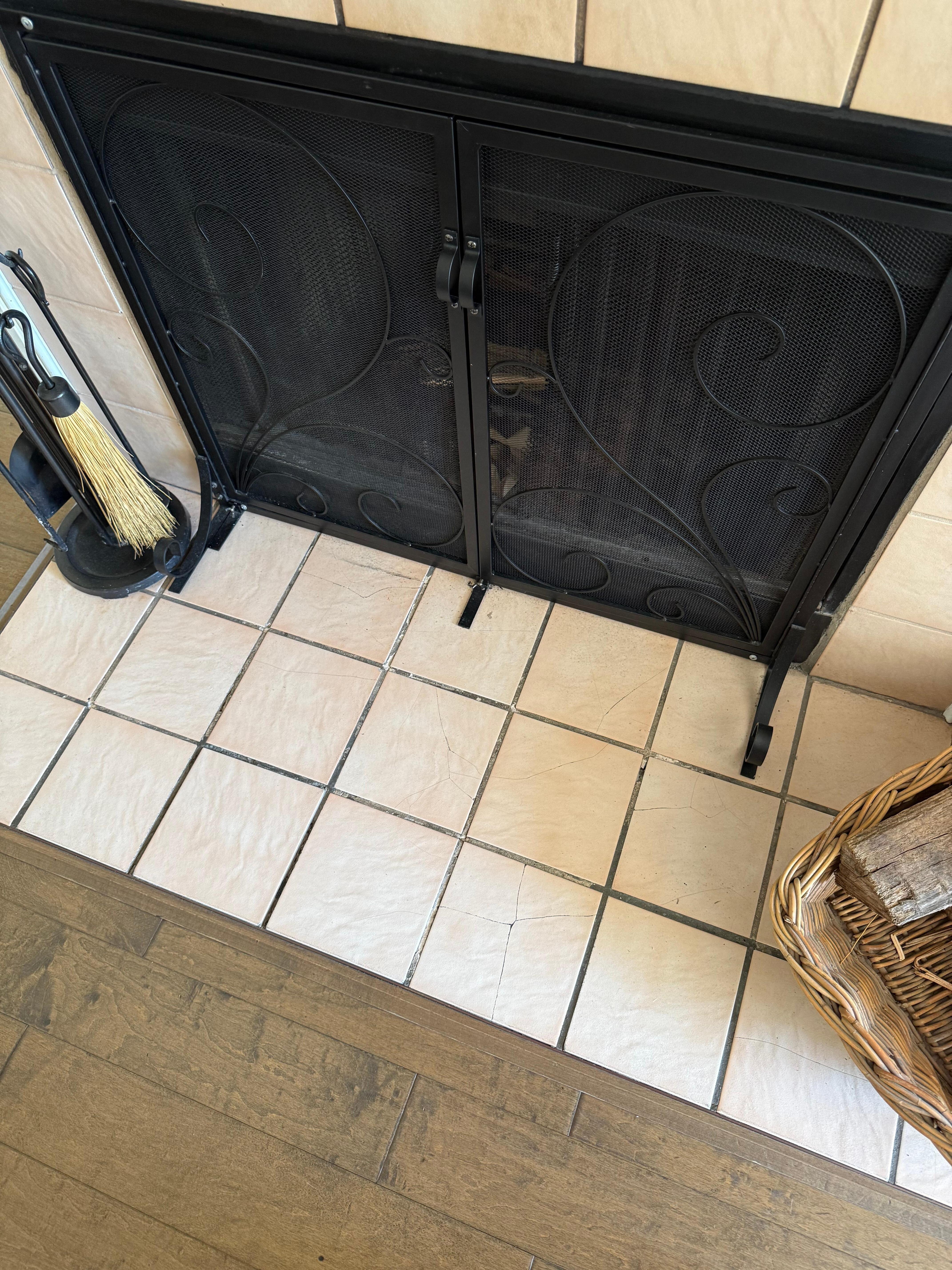 Broken fireplace tile. 