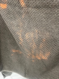 Outdated bath towels that had bleach stains