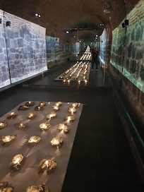 Sandals of fallen soldiers stretching to infinity