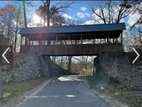 Take a drive over the hilly narrow road way in Bertha Brock Park.
This is a walking bridge over the roadway.