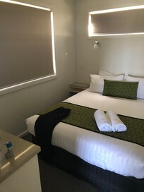 Very comfortable firm bed with crisp clean bedding