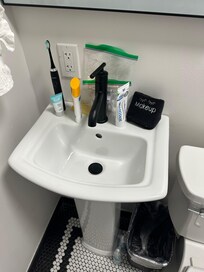No cabinet or counter space in bathroom