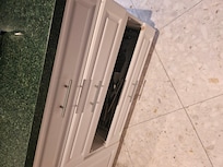 Missing kitchen drawer.
