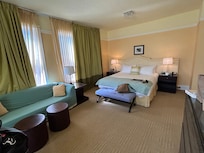 Spacious king suite, w/ a comfy bed.