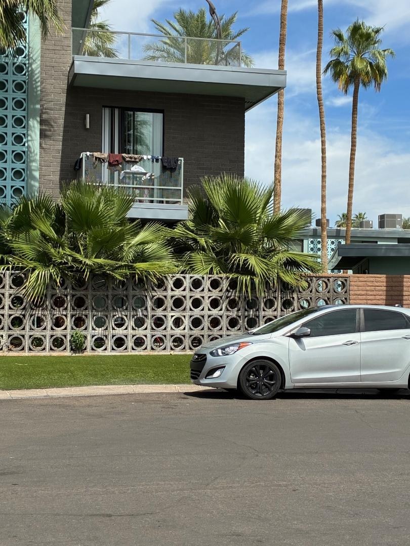 outdoor dining area looks a bit overgrown