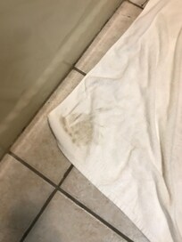 This is the towel that was used to wipe up the water it was just lightly swiped across the bathroom floor