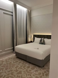 Supreme Room with (King bed) we found it was more like a North American Queen. Plush, luxurious...