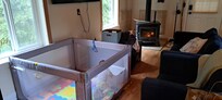 We brought our own playpen for the baby. It was a must, especially to keep her away from the wood stove.