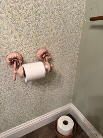 This was falling off the wall had to hold with one hand to use.